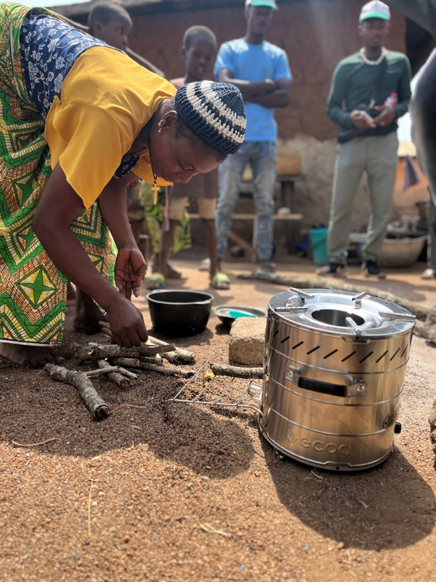Woman using one of the cookstoves distributed by project Bissap, in Benin